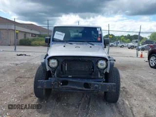 2018 Jeep Wrangler Unlimited Sahara with VIN 1C4BJWEGXJL806832, listed as a IAAI auction lot 42605892 with 90,535 mi miles and . Bid and sale history available at DreamBid. Image 12.