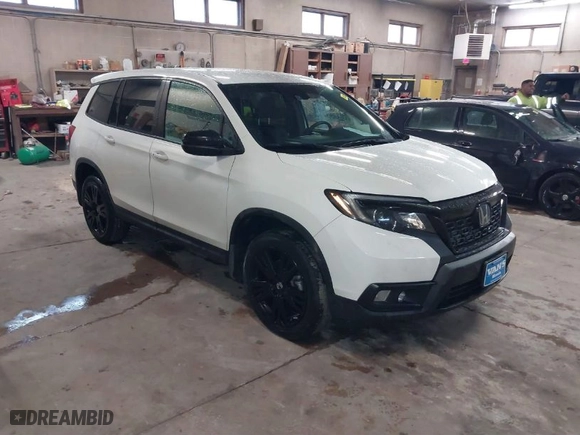 2021 Honda Passport Sport with VIN 5FNYF8H29MB021314, listed as a IAAI auction lot 41712033 with 55,357 mi miles. Bid and sale history available at carsss.com. Image 1.