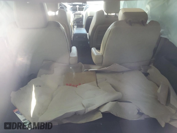 2012 Chevrolet Traverse LTZ z VIN 1GNKVLED1CJ170106, wystawiony jako Copart lot #52022235 z przebiegiem Nie podano mil oraz Szkoda całkowita • Salvage title. Historia ofert i sprzedaży dostępna na DreamBid. Obrazek 8.