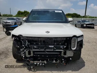2023 Rivian R1S Adventure z VIN 7PDSGABA7PN021756, wystawiony jako Copart lot #67650414 z przebiegiem 3284 mil mil oraz Szkody całkowita. Historia ofert i sprzedaży dostępna na DreamBid. Obrazek 5.