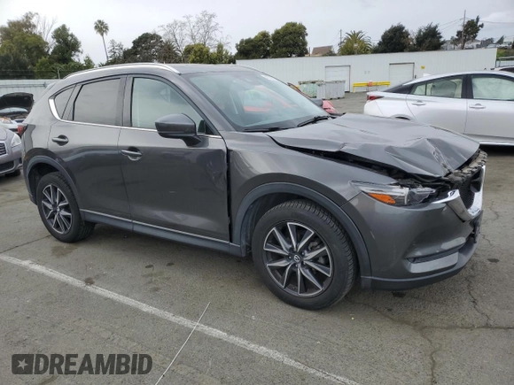 2018 Mazda CX-5 S Premium with VIN JM3KFBDM1J1352233, listed as a Copart auction lot 47082655 with 70,350 mi miles and Salvage Title. Bid and sale history available at DreamBid. Image 4.
