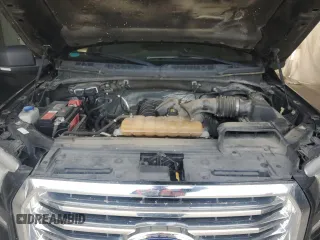 2015 Ford F-150 XLT with VIN 1FTEW1EF0FFA69722, listed as a Copart auction lot 59671695 with 189,690 mi miles and Salvage title. Bid and sale history available at DreamBid. Image 11.