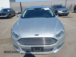 2016 Ford Fusion SE Hybrid z VIN 3FA6P0LU8GR203934, wystawiony jako IAAI lot #42595741 z przebiegiem 84 189 mil mil oraz . Historia ofert i sprzedaży dostępna na DreamBid. Obrazek 13.
