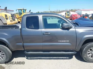 2016 Toyota Tacoma SR with VIN 5TFRX5GN6GX070766, listed as a IAAI auction lot 40461070 with 144,039 mi miles and . Bid and sale history available at DreamBid. Image 14.