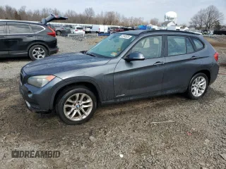 2015 BMW X1 xDrive28i with VIN WBAVL1C5XFVY31265, listed as a Copart auction lot 47543025 with 124,986 mi miles and Salvage Title. Bid and sale history available at carsss.com. Image 1.