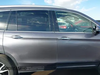 2019 Honda Pilot Touring 7-Passenger z VIN 5FNYF5H65KB020420, wystawiony jako IAAI lot #41575972 z przebiegiem 48 950 mil mil oraz . Historia ofert i sprzedaży dostępna na DreamBid. Obrazek 13.