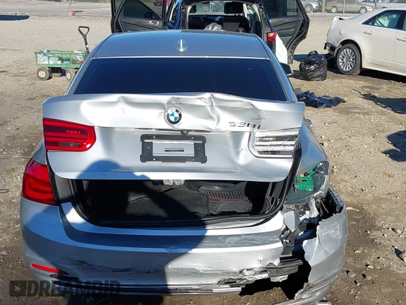 2018 BMW 3 Series 330i with VIN WBA8B9G58JNU97318, listed as a IAAI auction lot 41205434 with 62,582 mi miles and . Bid and sale history available at DreamBid. Image 16.