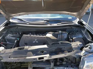 2015 Mitsubishi Outlander GT with VIN JA4JZ4AX1FZ005879, listed as a IAAI auction lot 41701299 with 212,805 mi miles and . Bid and sale history available at DreamBid. Image 10.