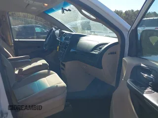 2016 Dodge Grand Caravan SE with VIN 2C4RDGBG2GR114564, listed as a IAAI auction lot 41838735 with 103,348 mi miles and . Bid and sale history available at DreamBid. Image 5.