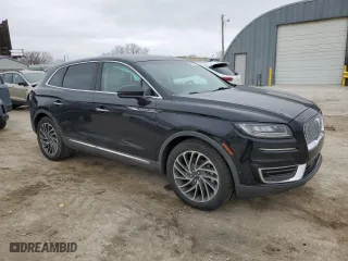 2019 Lincoln Nautilus Reserve with VIN 2LMPJ8L92KBL19504, listed as a Copart auction lot 87075174 with 61,359 mi miles and Salvage Title. Bid and sale history available at carsss.com. Image 4.