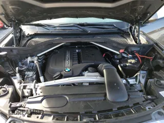 2015 BMW X6 xDrive35i with VIN 5UXKU2C52F0N77488, listed as a Copart auction lot 80152333 with 149,747 mi miles. Bid and sale history available at carsss.com. Image 12.