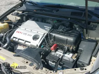 2005 Toyota Camry LE z VIN JTDBF32K850164577, wystawiony jako IAAI lot #43327160 z przebiegiem 229 910 mil mil oraz . Historia ofert i sprzedaży dostępna na DreamBid. Obrazek 14.