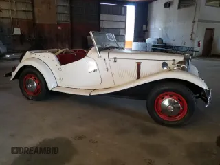 1971 Volkswagen Beetle with VIN 1112313102, listed as a Copart auction lot 55659265 with 3,677 mi miles and Salvage Title. Bid and sale history available at DreamBid. Image 4.