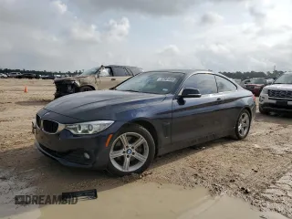 2014 BMW 4 Series 428i with VIN WBA3N3C57EF712742, listed as a Copart auction lot 52981695 with 102,313 mi miles and Salvage title. Bid and sale history available at DreamBid. Image 1.