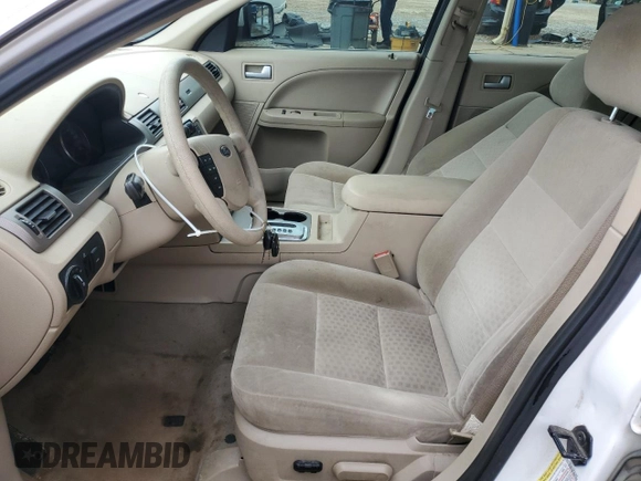 2005 Ford Five Hundred SE z VIN 1FAFP23155G171840, wystawiony jako Copart lot #54190685 z przebiegiem 147 383 mil mil oraz Szkoda całkowita • Salvage title. Historia ofert i sprzedaży dostępna na DreamBid. Obrazek 7.