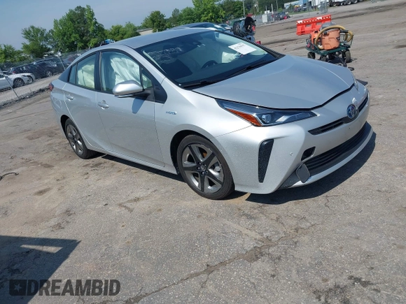 2021 Toyota Prius L Eco z VIN JTDKAMFU5M3137298, wystawiony jako IAAI lot #42270937 z przebiegiem 38 828 mil mil oraz . Historia ofert i sprzedaży dostępna na DreamBid. Obrazek 1.