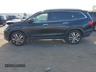 2017 Honda Pilot Touring with VIN 5FNYF6H9XHB062171, listed as a IAAI auction lot 41927969 with 210,633 mi miles. Bid and sale history available at carsss.com. Image 14.