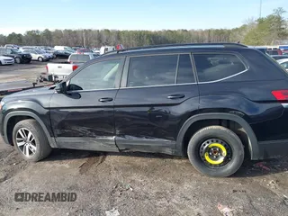 2021 Volkswagen Atlas SE with VIN 1V2DP2CA5MC545191, listed as a IAAI auction lot 41464429 with 90,350 mi miles and . Bid and sale history available at DreamBid. Image 14.