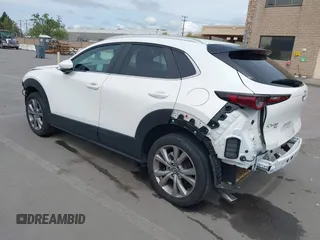 2023 Mazda CX-30 S Carbon Edition with VIN 3MVDMBCM0PM569100, listed as a IAAI auction lot 41978191 with 20,470 mi miles and . Bid and sale history available at DreamBid. Image 3.