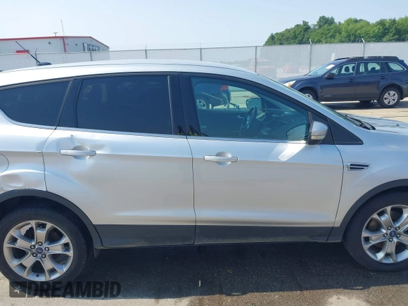 2013 Ford Escape SEL with VIN 1FMCU9H99DUA11243, listed as a IAAI auction lot 42356731 with 154,937 mi miles and . Bid and sale history available at DreamBid. Image 13.