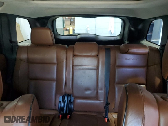 2015 Jeep Grand Cherokee Summit with VIN 1C4RJFJG1FC226591, listed as a Copart auction lot 52926115 with 130,803 mi miles and Salvage Title. Bid and sale history available at DreamBid. Image 10.