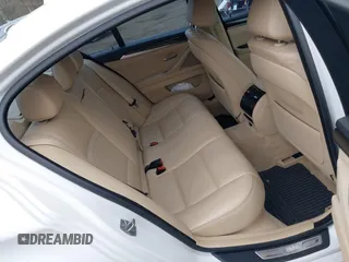 2014 BMW 5 Series 535i xDrive with VIN WBA5B3C57ED537549, listed as a IAAI auction lot 41047583 with 69,005 mi miles and . Bid and sale history available at carsss.com. Image 8.