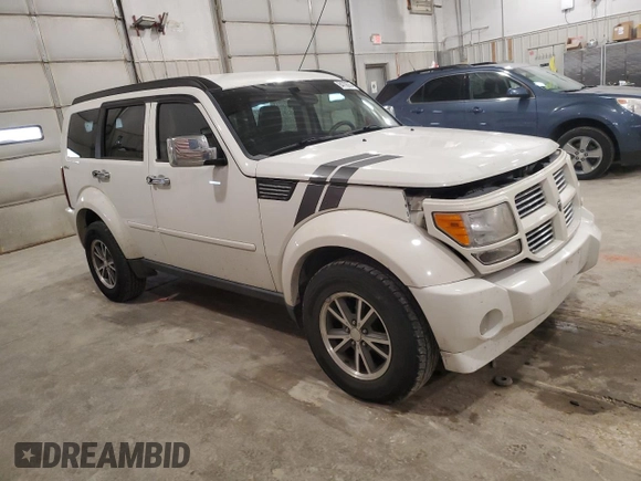 2009 Dodge Nitro SXT with VIN 1D8GU28K19W544135, listed as a Copart auction lot 84706354 with 98,925 mi miles and Salvage Title. Bid and sale history available at carsss.com. Image 4.