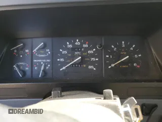1990 Ford Bronco z VIN 1FMCU12T2LUA31399, wystawiony jako Copart lot #77099614 z przebiegiem 85 663 mil mil oraz Szkoda całkowita • Salvage title. Historia ofert i sprzedaży dostępna na DreamBid. Obrazek 9.