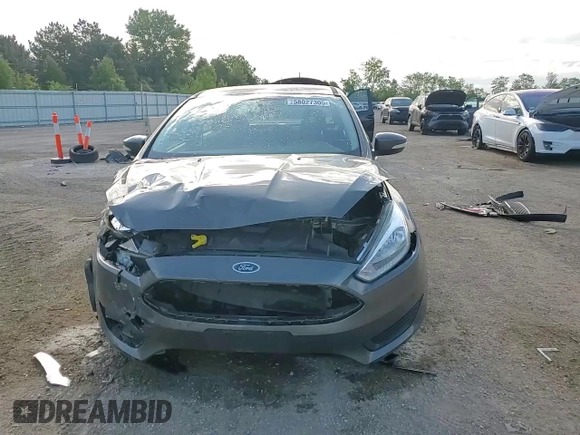 2016 Ford Focus SE with VIN 1FADP3F21GL403961, listed as a Copart auction lot 58027305 with 84,020 mi miles and Salvage title. Bid and sale history available at DreamBid. Image 14.