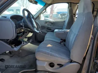 1997 Ford F-150 XL with VIN 1FTDX1866VKB08985, listed as a Copart auction lot 43708935 with 208,670 mi miles and Salvage title. Bid and sale history available at DreamBid. Image 7.