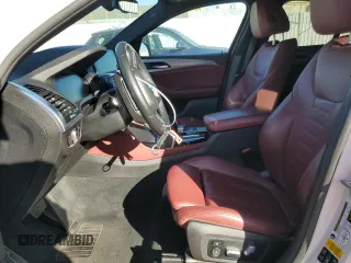 2020 BMW X4 xDrive30i with VIN 5UX2V1C09L9B97540, listed as a Copart auction lot 73984983 with 64,343 mi miles. Bid and sale history available at carsss.com. Image 7.