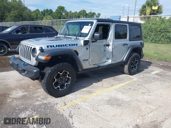 2023 Jeep Wrangler Rubicon with VIN 1C4JJXR63PW703424, listed as a IAAI auction lot 42639653 with 46,412 mi miles and . Bid and sale history available at DreamBid. Image 16.