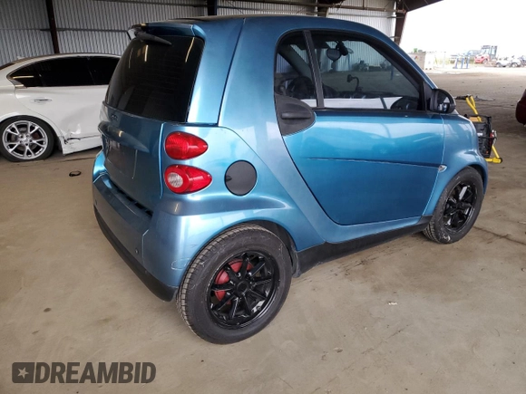2009 Smart fortwo Pure with VIN WMEEJ31XX9K264071, listed as a Copart auction lot 55315705 with 117,006 mi miles and Salvage Title. Bid and sale history available at carsss.com. Image 3.