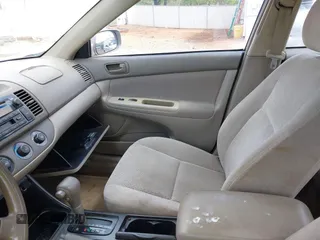 2004 Toyota Camry LE with VIN 4T1BE32K64U265994, listed as a IAAI auction lot 42015312 with 273,408 mi miles. Bid and sale history available at carsss.com. Image 5.