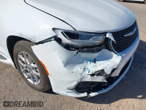 2023 Chrysler Pacifica Touring L with VIN 2C4RC1BG6PR531640, listed as a IAAI auction lot 42251680 with 31,638 mi miles and . Bid and sale history available at DreamBid. Image 6.