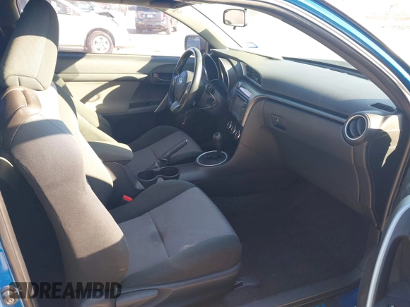 2014 Scion tC with VIN JTKJF5C78E3079618, listed as a IAAI auction lot 41107330 with 112,105 mi miles. Bid and sale history available at carsss.com. Image 5.