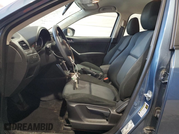 2015 Mazda CX-5 Sport with VIN JM3KE4BY9F0552942, listed as a Copart auction lot 54750245 with 129,700 mi miles and Salvage title. Bid and sale history available at DreamBid. Image 7.