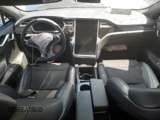 2018 Tesla Model S 75D with VIN 5YJSA1E25JF249743, listed as a Copart auction lot 59636235 with 101,275 mi miles and Salvage title. Bid and sale history available at DreamBid. Image 8.