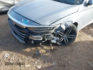 2021 Honda Accord Touring with VIN 1HGCV3F91MA002413, listed as a IAAI auction lot 40682887 with 101,653 mi miles and . Bid and sale history available at DreamBid. Image 6.