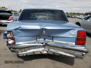 1989 Oldsmobile Delta z VIN 1G3HN54C8KH301125, wystawiony jako Copart lot #70709764 z przebiegiem 87 068 mil mil oraz Tytuł czysty. Historia ofert i sprzedaży dostępna na DreamBid. Obrazek 6.
