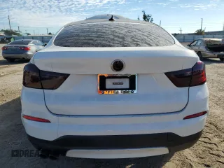 2015 BMW X4 xDrive28i with VIN 5UXXW3C57F0M88974, listed as a Copart auction lot 36212923 with 138,948 mi miles. Bid and sale history available at carsss.com. Image 6.