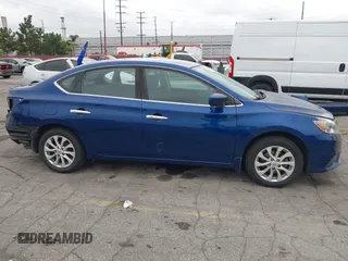 2019 Nissan Sentra SV z VIN 3N1AB7AP6KY221889, wystawiony jako IAAI lot #42077285 z przebiegiem 254 481 mil mil oraz . Historia ofert i sprzedaży dostępna na DreamBid. Obrazek 14.