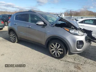 2018 Kia Sportage EX z VIN KNDPNCAC1J7308457, wystawiony jako Copart lot #81574704 z przebiegiem Nie podano mil oraz Szkoda całkowita • Salvage title. Historia ofert i sprzedaży dostępna na DreamBid. Obrazek 4.