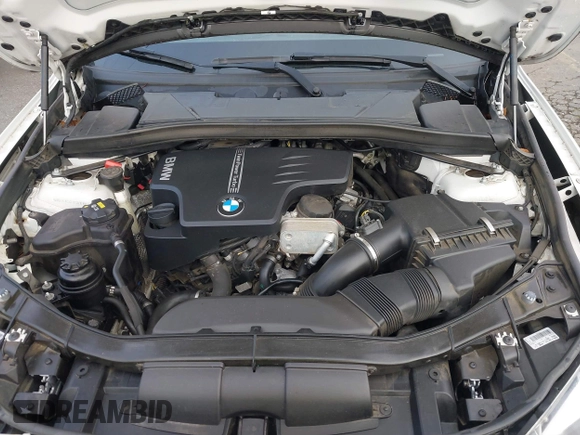2015 BMW X1 xDrive28i z VIN WBAVL1C54FVY38101, wystawiony jako IAAI lot #41344120 z przebiegiem 130 000 mil mil oraz . Historia ofert i sprzedaży dostępna na DreamBid. Obrazek 10.