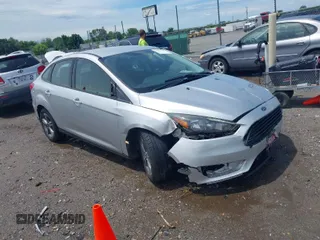 2017 Ford Focus SE with VIN 1FADP3FE4HL295573, listed as a IAAI auction lot 39562568 with 96,939 mi miles and . Bid and sale history available at carsss.com. Image 1.