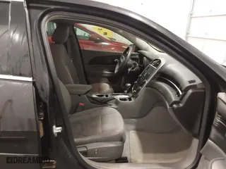 2015 Chevrolet Malibu LS with VIN 1G11A5SL3FF323365, listed as a IAAI auction lot 41854940 with 146,167 mi miles. Bid and sale history available at carsss.com. Image 5.