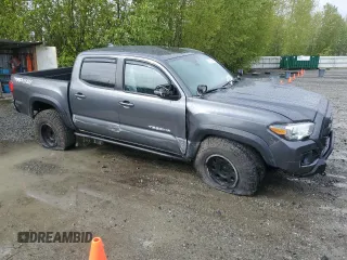 2019 Toyota Tacoma SR with VIN 3TMCZ5AN7KM237563, listed as a Copart auction lot 53919355 with 65,392 mi miles and Salvage title. Bid and sale history available at DreamBid. Image 4.