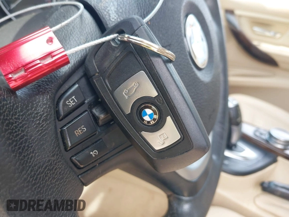 2014 BMW 3 Series 328i xDrive with VIN WBA3B5G51ENS11317, listed as a IAAI auction lot 42494223 with 171,528 mi miles and . Bid and sale history available at DreamBid. Image 11.
