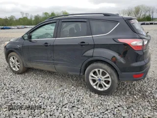 2018 Ford Escape SE z VIN 1FMCU9GD8JUA89756, wystawiony jako Copart lot #55978345 z przebiegiem 115 089 mil mil oraz Tytuł czysty. Historia ofert i sprzedaży dostępna na DreamBid. Obrazek 2.