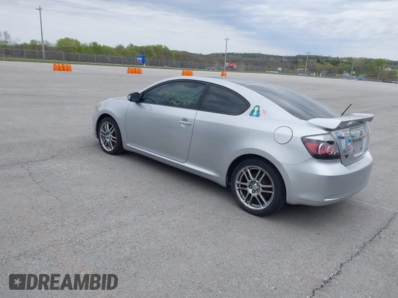 2009 Scion tC with VIN JTKDE167190282930, listed as a IAAI auction lot 42034538 with 198,964 mi miles. Bid and sale history available at carsss.com. Image 3.